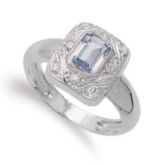 18K SORTIJA ORO BLANCO MOTIVO RECTANGULAR CON AGUAMARINA Y CIRCONITAS, ANCHO: 12 MM