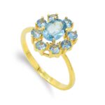 18K SORTIJA ORO AMARILLO CUAJO CIRCONITA COLOR AGUAMARINA, MEDIDA: 12 X 10MM