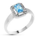 18K SORTIJA ORO BLANCO PIEDRA COLOR Y CIRCONITAS, MEDIDA: 9,5 X 8 MM