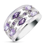 18K SORTIJA ORO BLANCO CALADA CON CIRCONITAS MORADAS Y MALVA, ANCHO: 11 MM
