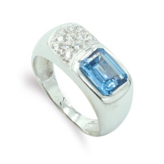 18K SORTIJA ORO BLANCO PIEDRA AZUL 8X6 MM Y CIRCONITAS